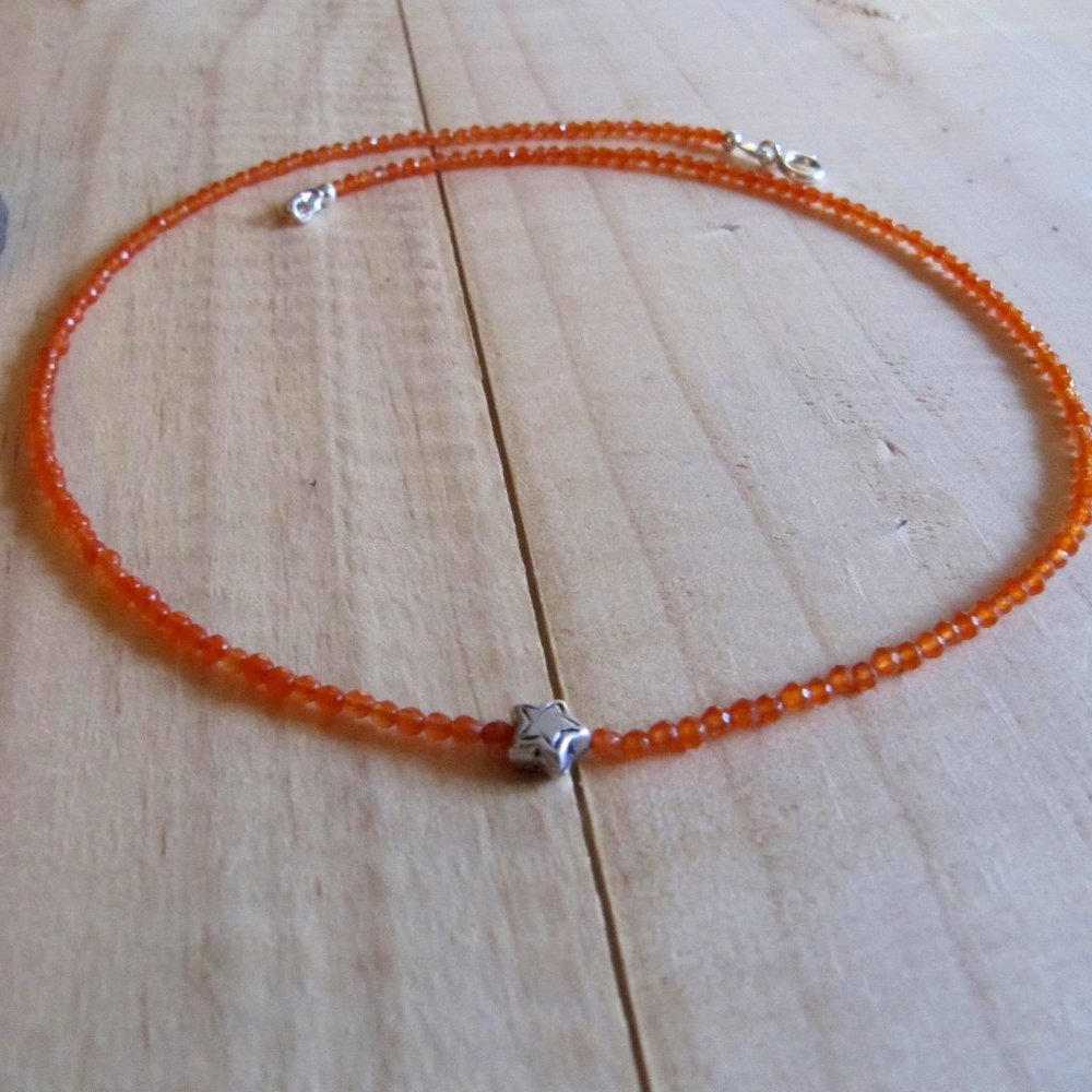 Carnelian necklace with a little sterling silver flower